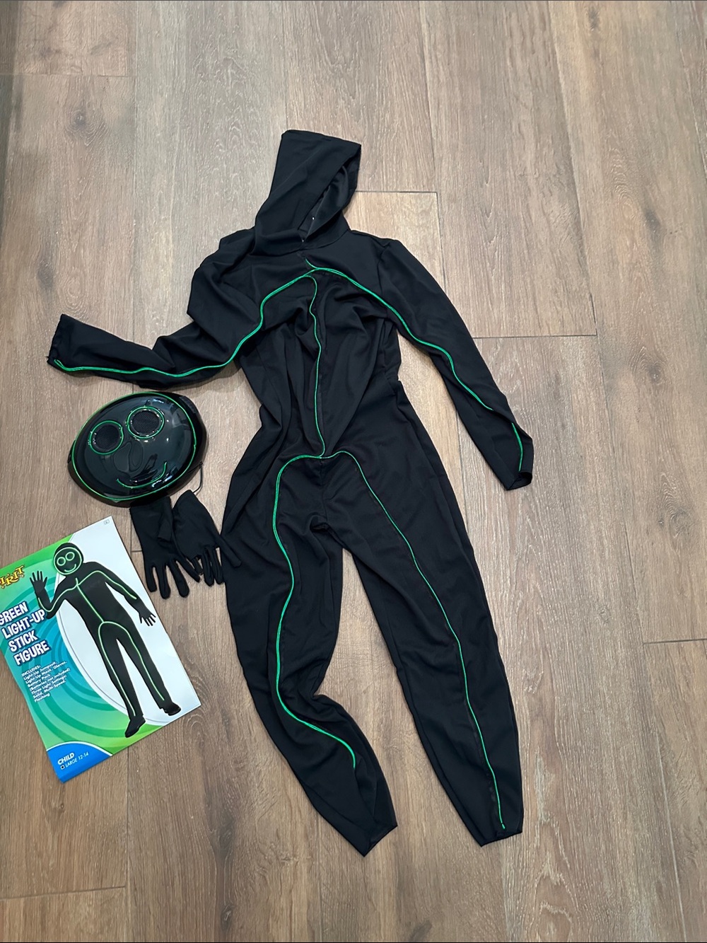 Spirit Black Costume with Green Trim Kids Light-Up Stick Figure.